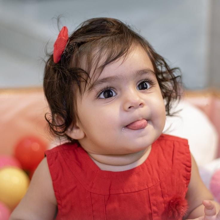 Amara Singh, Lead Design Curator at Field Stable Gradient, reviewing corporate floral arrangements